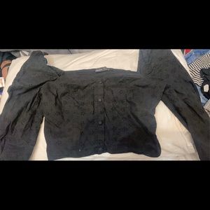 Black off shoulder long sleeve shirt